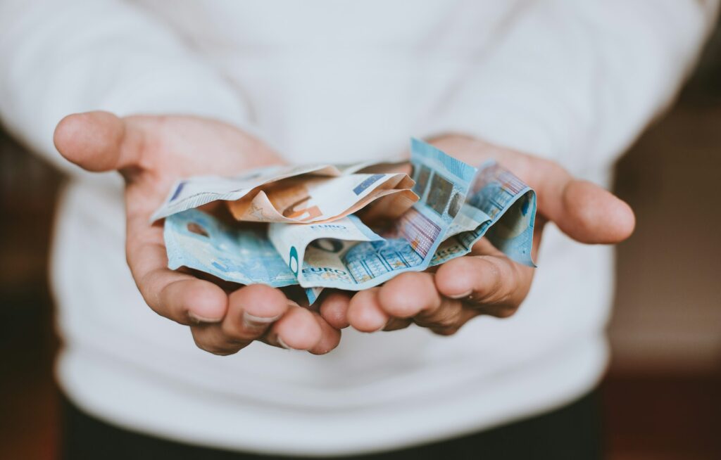 Pinigai. Unsplash nuotr.